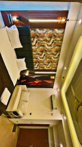 an overhead view of a bathroom with a ceiling at Omaxe Lucknow Luxury Home in Nalmatha