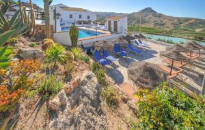 an aerial view of a villa with a swimming pool at La Cuadra in Málaga
