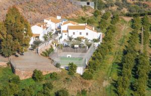 an aerial view of a house with a tennis court at La Cuadra in Málaga +22 photos