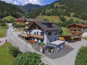 an aerial view of a house in the mountains at Golden Hirsch in Rauris