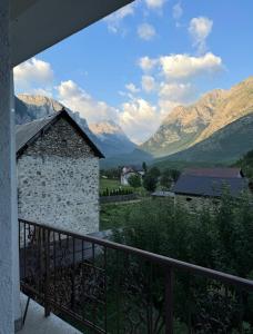 a view of a mountain range from a balcony at Highland guest house Vuthaj in Vusanje