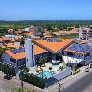 an overhead view of a building with solar panels on its roofs at Nautillus Hotel in Parnaíba