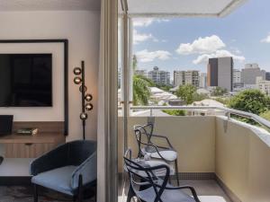 a balcony with a view of a city at Mercure Brisbane Spring Hill in Brisbane