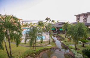 an aerial view of a resort with a swimming pool at Life Resort - Flat Aconchegante in Brasília
