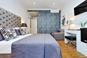 Postel nebo postele na pokoji v ubytování Vatican Chic B&B