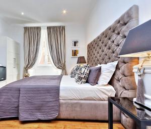 Postel nebo postele na pokoji v ubytování Vatican Chic B&B