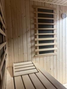 an empty sauna with a bench in it at The Valley Queens in Bovec