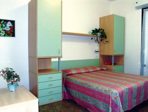 Postel nebo postele na pokoji v ubytování Hotel Basilea