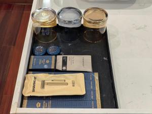 a drawer with jars of food on a table at Bor Manju Vacation guesthouse--Near the Ticket Gate--service in Chinese and English in Zhangjiajie