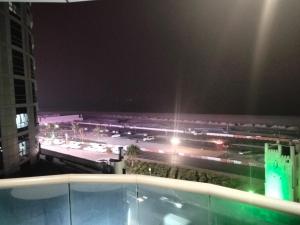 a view of a parking lot at night at imperial homes 2 in Ajman 