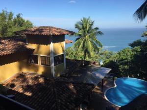 Vista de la piscina de Casa com linda vista para o mar o alrededores