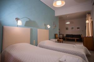 Postel nebo postele na pokoji v ubytování Hotel Liberty