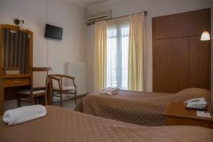 Postel nebo postele na pokoji v ubytování Hotel Liberty