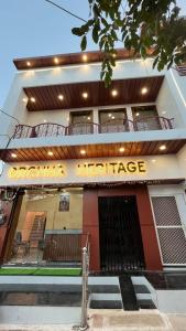 a building with a sign that reads atomic heritage at Hotel Orchha Heritage in Orchha