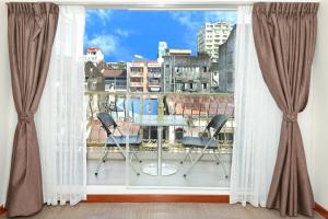 Balkón nebo terasa v ubytování Hotel Bond