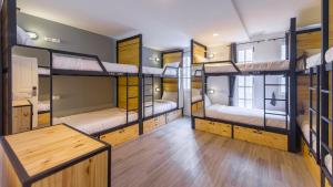 Postel nebo postele na pokoji v ubytování X9Hostel
