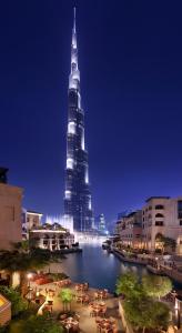 a view of the tallest building in the world at night at Palace Downtown in Dubai