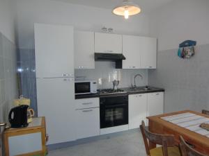 Kuchyňa alebo kuchynka v ubytovaní Casa Piva