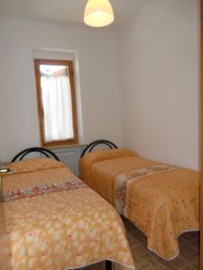 Posteľ alebo postele v izbe v ubytovaní Casa Piva