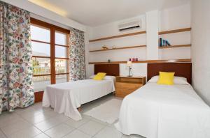 Ein Bett oder Betten in einem Zimmer der Unterkunft Villa Gotmar