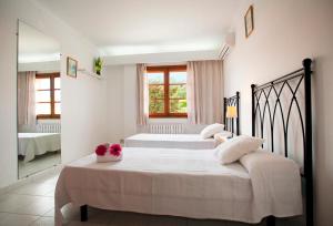 Ein Bett oder Betten in einem Zimmer der Unterkunft Villa Gotmar