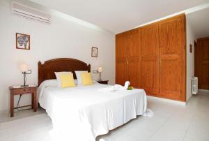 Ein Bett oder Betten in einem Zimmer der Unterkunft Villa Gotmar