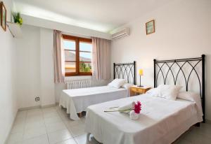 Ein Bett oder Betten in einem Zimmer der Unterkunft Villa Gotmar