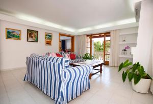 Ein Bett oder Betten in einem Zimmer der Unterkunft Villa Gotmar