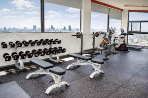 a gym with a bunch of bikes and weights at DAO NGOC BEACH HOTEL Da Nang in Danang