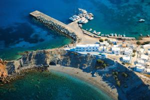 an aerial view of a island with white buildings at Vardia Bay Studios in Karavostasi