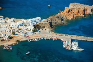 an aerial view of a harbor with boats in the water at Vardia Bay Studios in Karavostasi