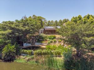 an aerial view of a garden with a house at Kwendalo in Plettenberg Bay