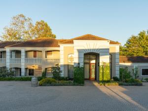 a rendering of a house with a driveway at Kwendalo in Plettenberg Bay