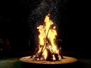 a large bonfire is burning in the dark at Lethabong Lodge in Thabazimbi