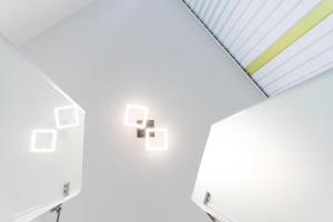a room with white walls and a skylight at Black & White in Ilmmünster +34 photos