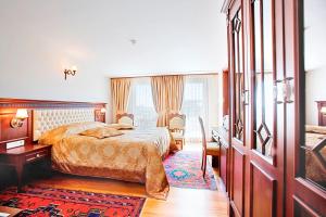 Postel nebo postele na pokoji v ubytování Hippodrome Hotel