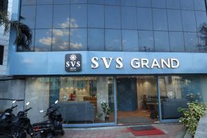 a store sign foryss grand in front of a building at SVS Grand in Dindigul