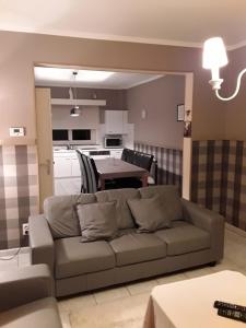 a living room with a couch and a table at Wenceslas Cobergher III in Bertem