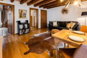 a living room with a couch and a table at Apartment Walhallastrasse in Arbon