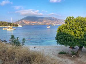 a view of a lake with boats in the water at Eleni's Cottage in Fiskardo