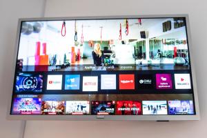 a television screen with a display of a store at Al Melograno in Aquilinia
