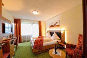 Postel nebo postele na pokoji v ubytování Wellness-Hotel Talblick