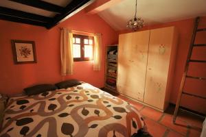 Ліжко або ліжка в номері Casa Tajinastes del Teide