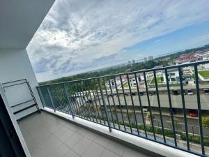 a balcony with a view of a highway at PeaceStay in Sandakan