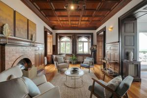 a living room with a couch and a fireplace at Blissful Seafront in Cascais
