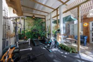 a gym with several exercise bikes in a room at Abalú Collection Hotel Life Gran Via in Madrid