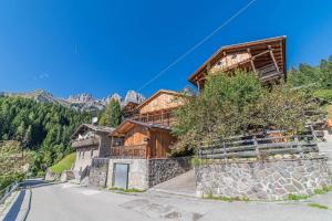 a house on the side of a mountain at Chalet Dolomites Heart in Feder