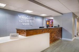 a welcome to the empire state sign on a wall at Hampton Inn East Aurora, NY in East Aurora +37 photos