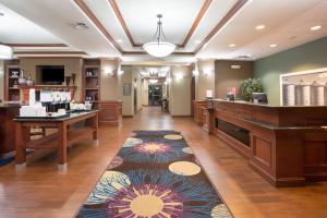 a hair salon with a reception desk at Hampton Inn Siloam Springs in Siloam Springs