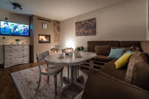 Un lugar para sentarse en Rys Apartmány - Liptov